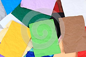 Crumpled color papers background