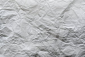 crumpled cream craft paper background texture. closeup