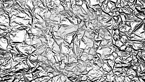 Crumpled foil sheet background texture , silver aluminum foil as background for design