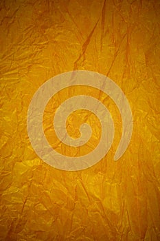 Crumpled gold paper recycling background