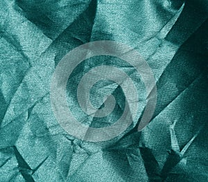 Crumpled green fabric texture