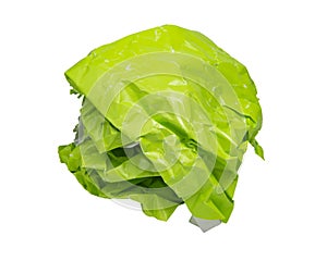 Crumpled green paper ball isolated on the white background