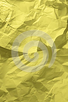 Crumpled Illuminating colored paper as background or texture. Eco packaging