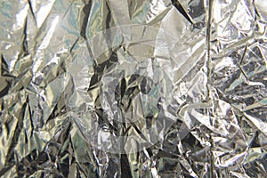 Crumpled metal foil background