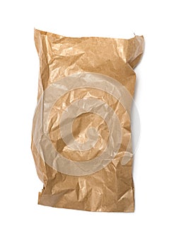 Crumpled paper bag with grease spots