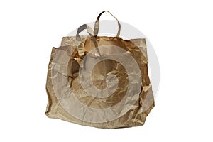 crumpled paper bag with handles on a white background