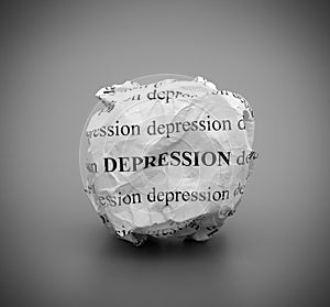 Crumpled paper ball with words Depression on gray background