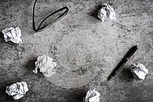 Crumpled paper balls on grunge background, Creativity problems