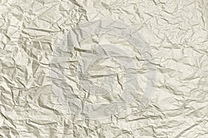 Crumpled paper ivory color texture. Abstract background. Mockup for your design