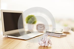 Crumpled paper on office desk