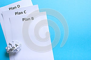 Crumpled paper Plan A and clean sheet Plan B C D