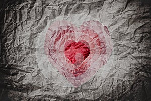 Crumpled paper texture with cut as heart shape in many layers, abstract heart background, collage style