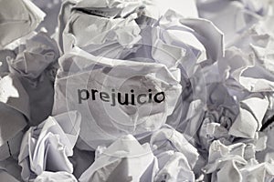 Paper written prejuicio, spanish word for prejudice. Concept of photo