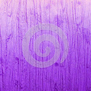 Crumpled purple fabric with gradient