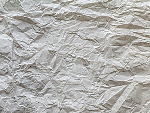 Crumpled recycled gray packing paper