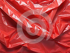 crumpled red plastic texture background