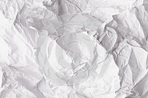 Crumpled relievo soft white paper texture.