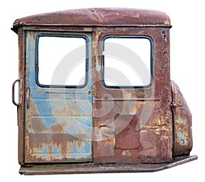 Crumpled rusty metal door of  the diesel  retro vintage  tractor isolated