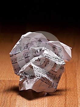 Crumpled sheet of music notes