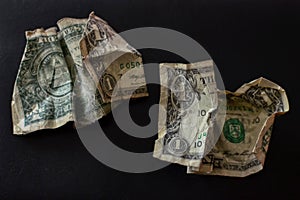 Crumpled torn old dirty paper dollars