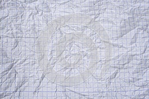 Crumpled white graph paper