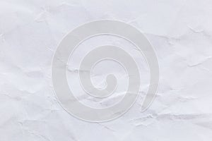 Crumpled white paper background for design.