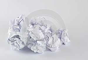 Crumpled white papers isolated on white