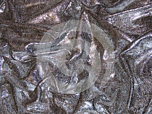 Crunched silver textile photo