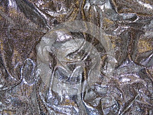 Crunched silver textile photo