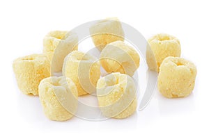 Crunchy corn snacks on a white background