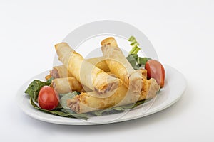 Crunchy crispy cheese rolls isolated on white