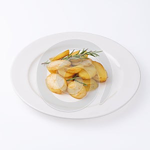 Crunchy fried potato slices with fresh rosemary isolated on white background