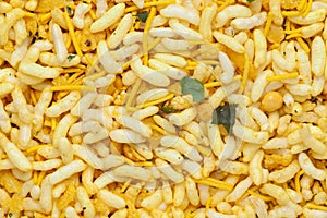 Crunchy Murmura full-frame wallpaper, made with Puffed Rice, Besan sev and Curry leaves.