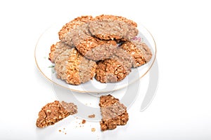 Crunchy oat biscuits/cookies on a white plate