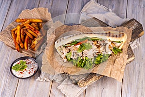 Crunchy pita with grilled gyros meat. Gyro pita, shawarma.