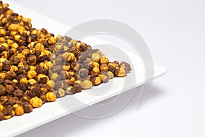 Crunchy Roasted Chana Masala in a white ceramic square plate Top Lighting