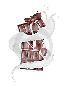 Crushed chocolate with milk splashes isolated on a white