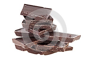 Crushed dark chocolate pieces on white background