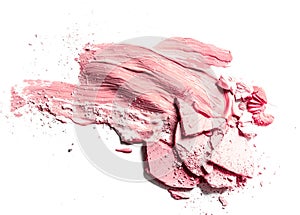 Crushed eyeshadow, powder and liquid foundation close-up isolated on white background