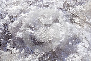 crushed ice with irregularities, depressions and bulges