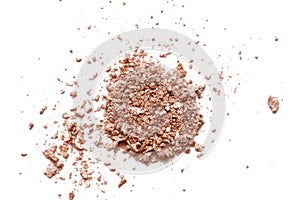 Crushed nude shimmer eye shadow texture  on white background. Face powder, bronzer swatch. Broken eye shadow smear. Cosmet