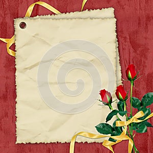 Crushed paper with roses on the red background