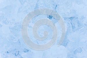 Crushed pieces of ice with snow background texture