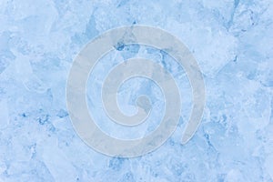 Crushed pieces of ice with snow background texture