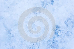Crushed pieces of ice with snow background texture