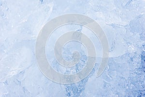 Crushed pieces of ice with snow background texture