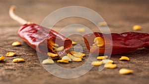 Crushed red cayenne pepper, dried chili with seeds, closeup macro