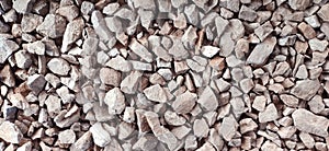 Crushed stones background on the railway