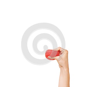 Crushing out all that stress. Cropped view of a womans hand squeezing a stress ball against a white background.