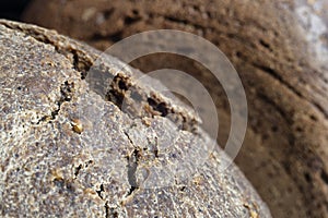 Crust of homemade Borodino bread with coriander and cracks